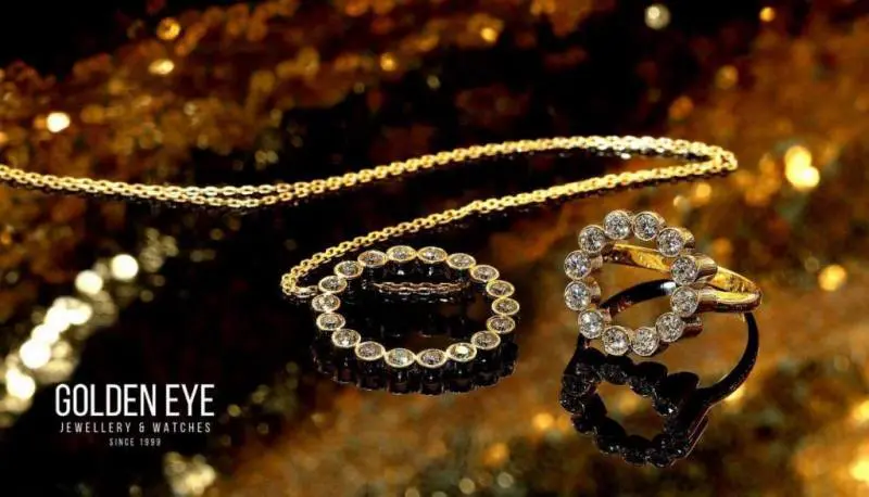 مجموعة مجوهرات العين الذهبية من الذهب والماس للنساء